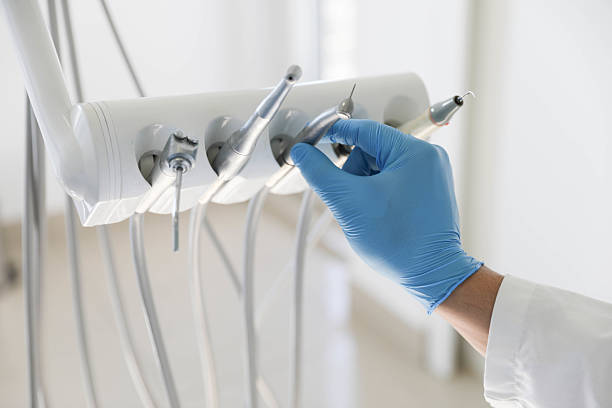 Professional Tooth Extraction technician working in Roanoke, IL